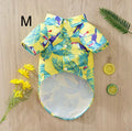 Camisa hawaiana para peluditos con palmas y tucanes