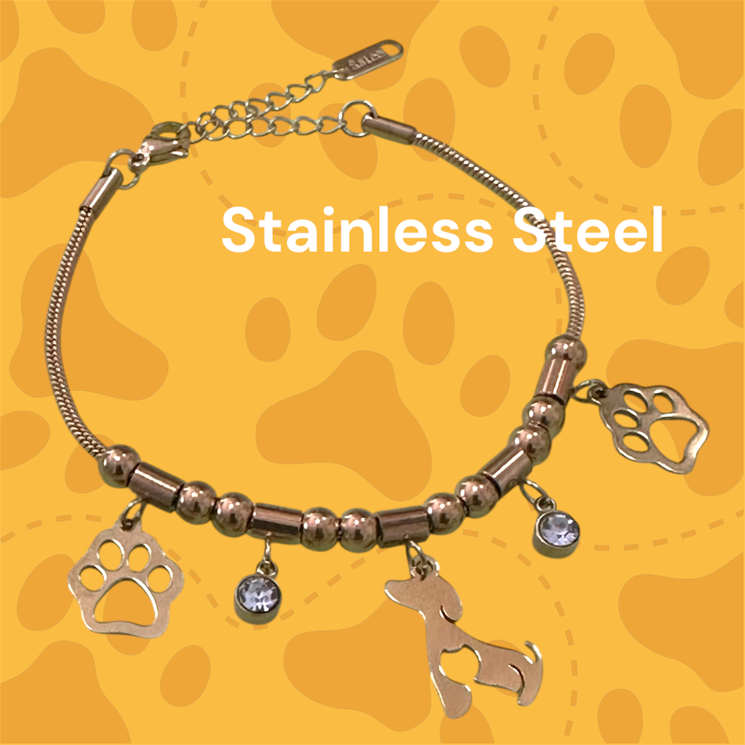 Pulsera dorada en Stainless Steel con dijes de mascotas