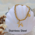 Pulsera elástica color dorada en acero inoxidable con dije de perrito