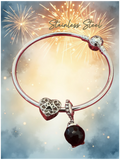 Pulsera rígida en acero inoxidable con dije de corazón y huellita