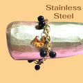 Pulsera dorada en Acero Inoxidable con cuentas negras y dije de perrito con corazón